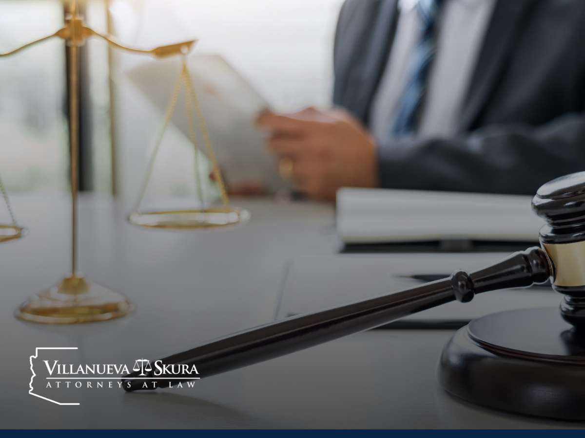 A lawyer's office with a focus on scales of justice and a gavel, representing legal defense against sexual assault charges